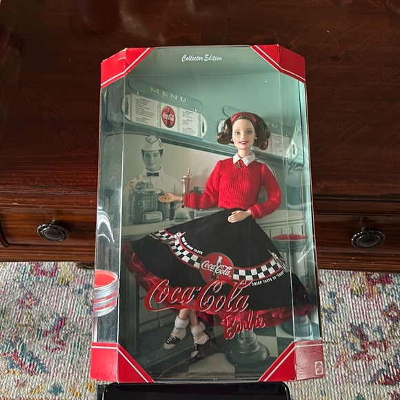 Coca-Cola sweetheart Barbie product number is 24637 year 2000 never been opened